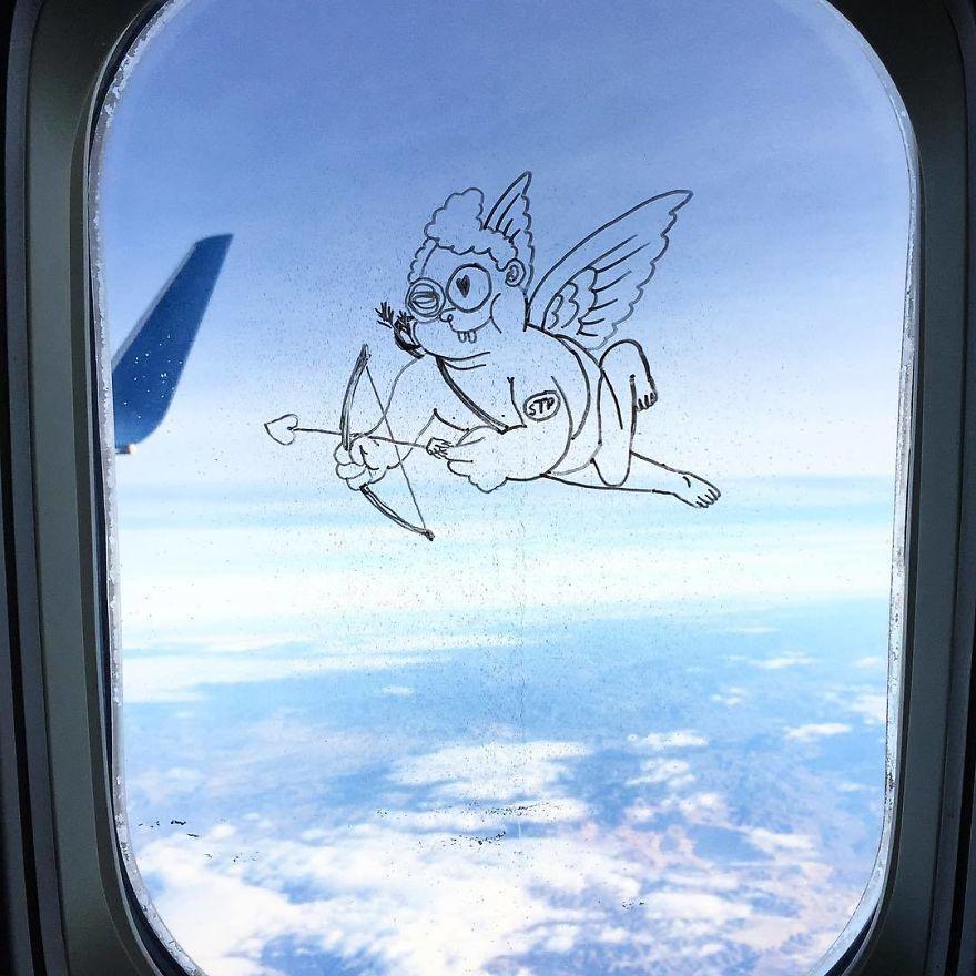 Рисунки на окнах самолета